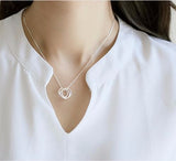 Sterling Silver Karma Pendant Necklace